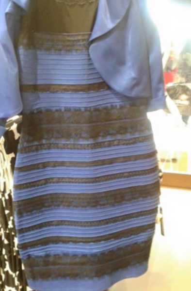 Dress with stripes that either look black and blue, or white and gold